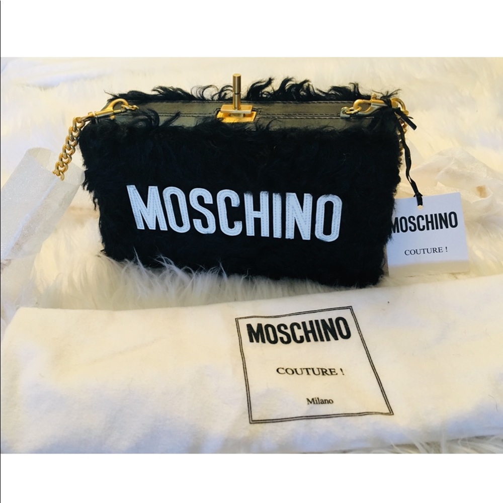 Moschino clutch with chain. Made in Italy
